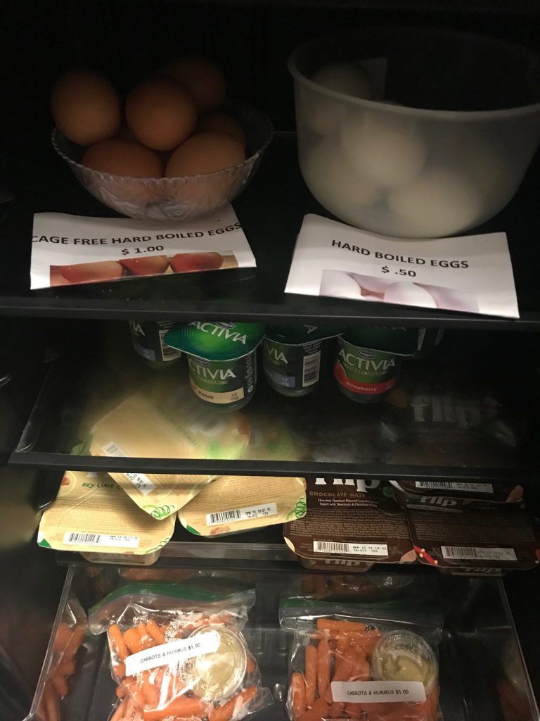 close-up of eggs, yogurt, cheese, and carrots