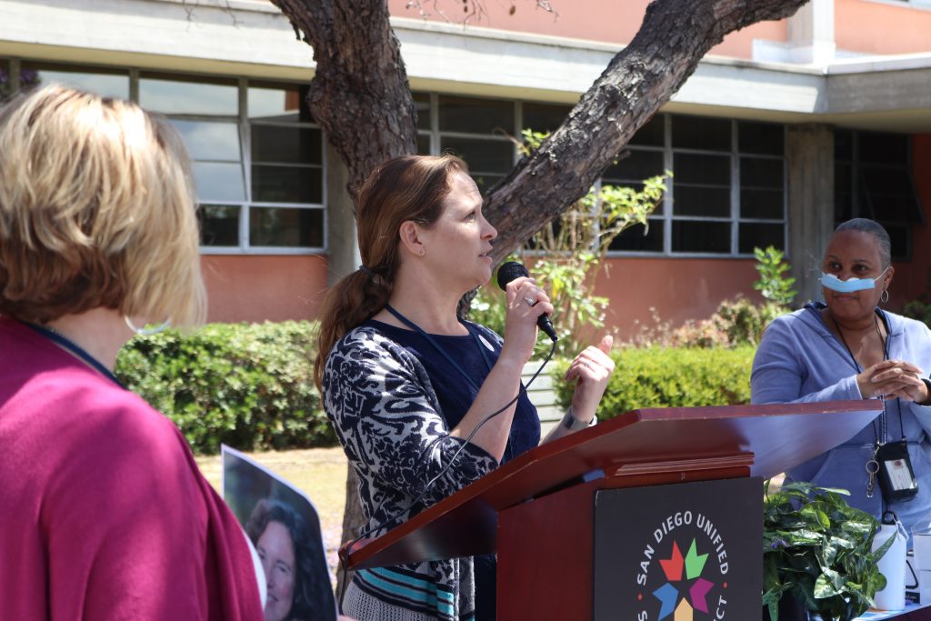 person speaking from podium