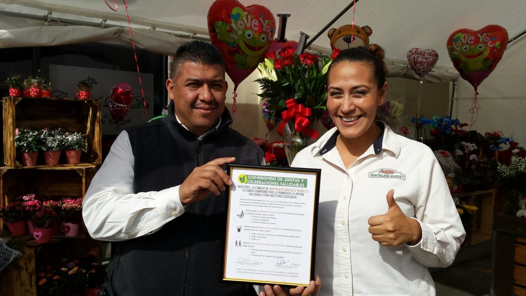 two people holding sign