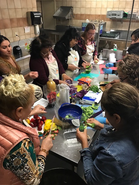 people preparing food together