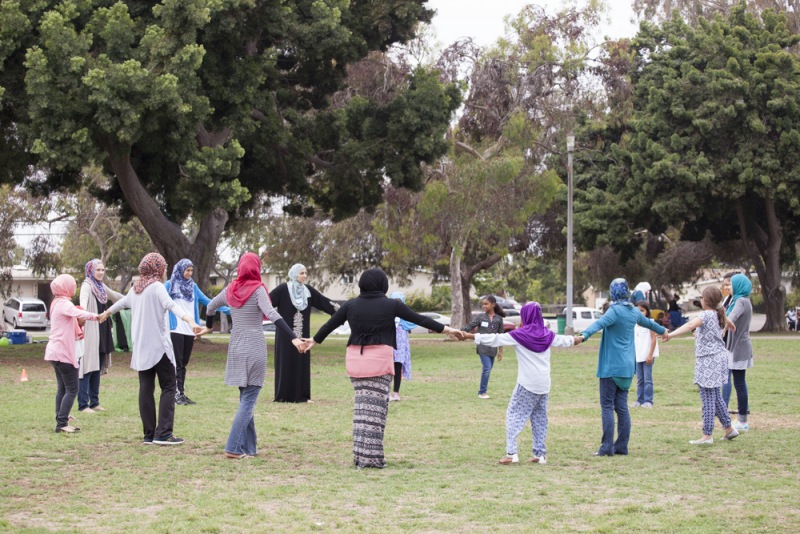 holding hands in circle