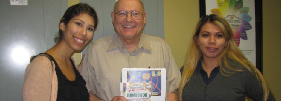 three people smiling with gonzalez handbook